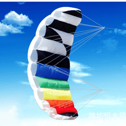 Wikz Parafoil drage i twilight rainbow farver, vist på blå baggrund