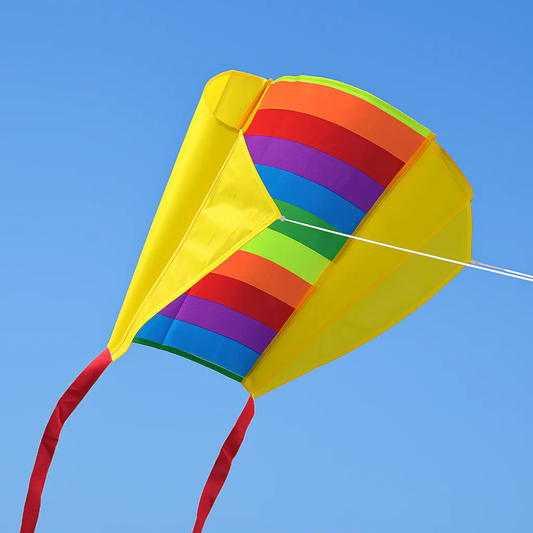 Wikz Spectrum Parafoil drage i sunset farver, vist på blå baggrund