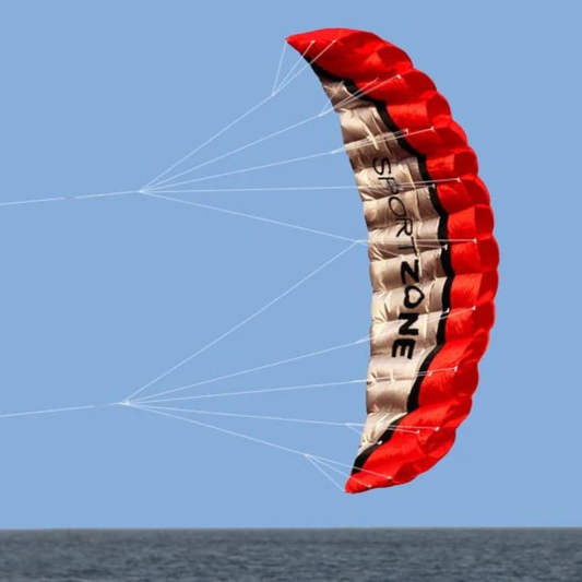 Sportzone Parafoil drage i rød, flyvende mod blå himmel
