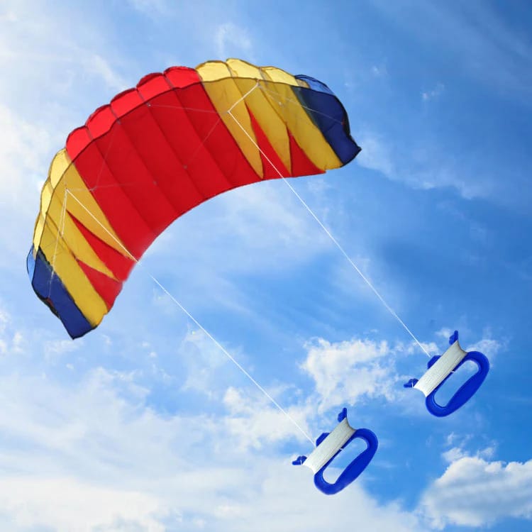 Wikz Parafoil drage i sunset farver rød og gul, vist på blå baggrund